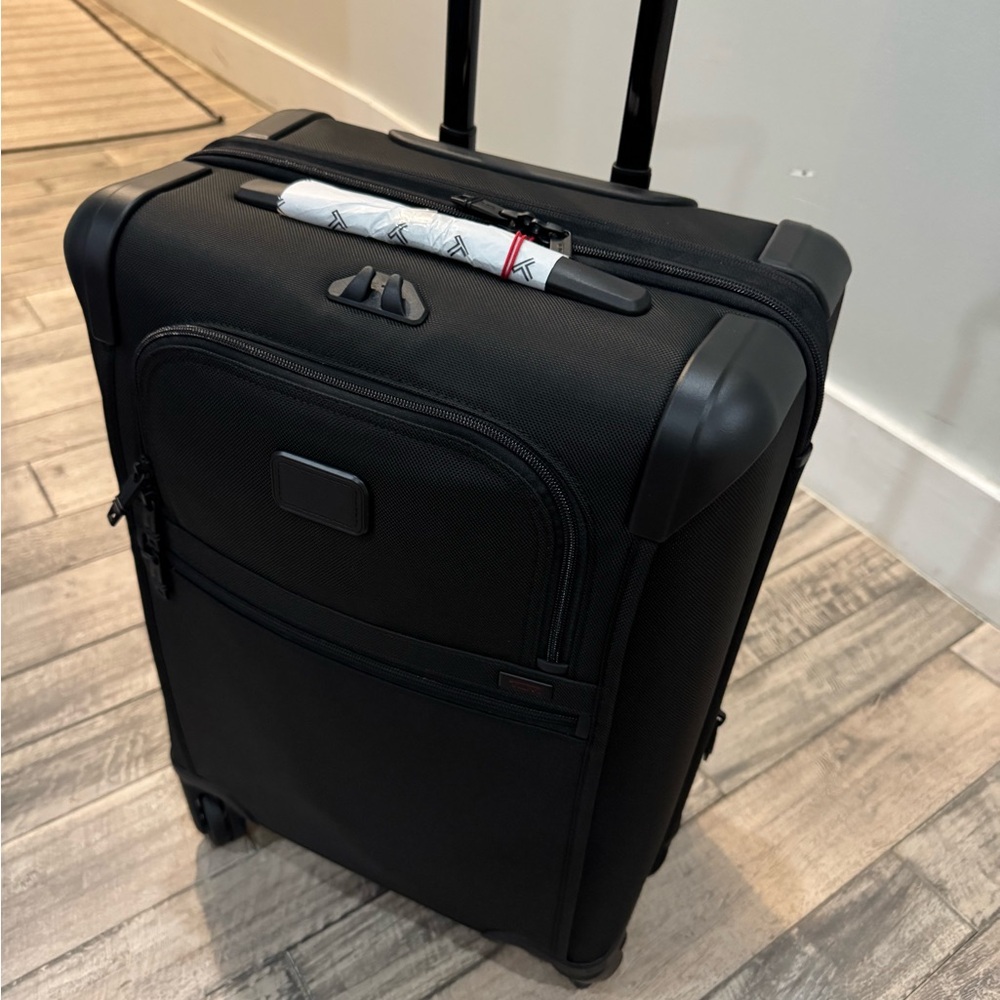 Tumi Black Expandable Rolling Luggage